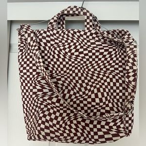 Maroon Trippy Checker, pre-owned in good condition except stain on bottom.